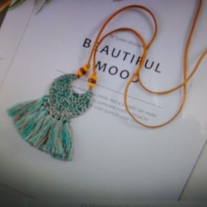 Super cute tassel and leather necklace